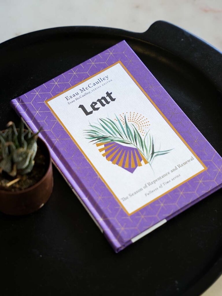 Lent book placed on a coffee table next to a small plant